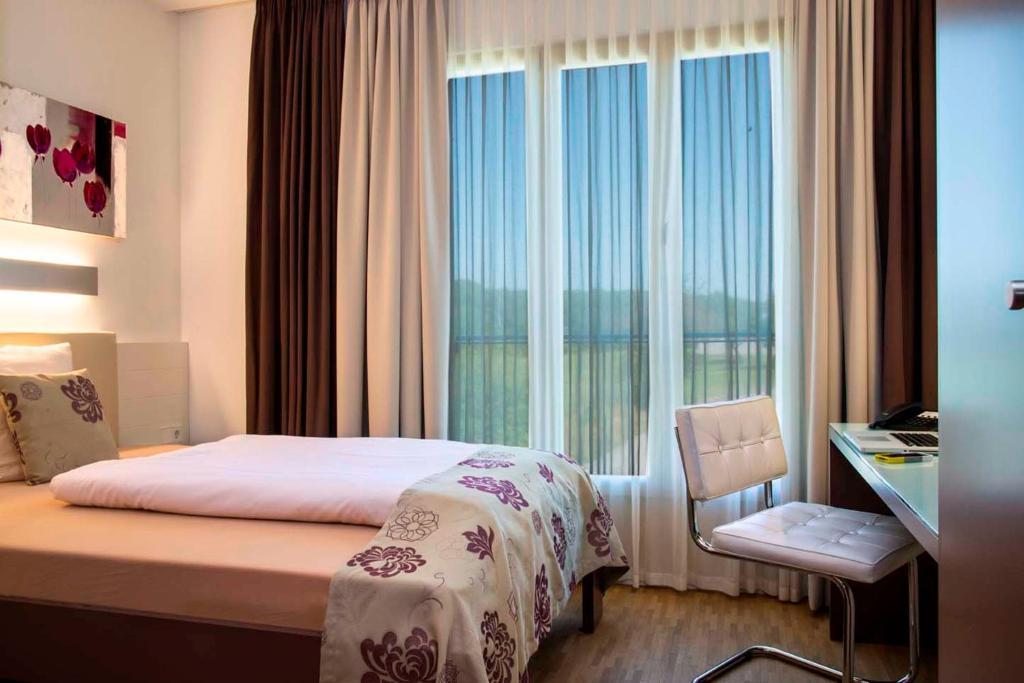 Hotel Simon'S Plaza เกรว็องมาเช ห้อง รูปภาพ